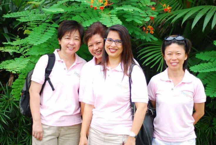 A group of woman smiling at the camera